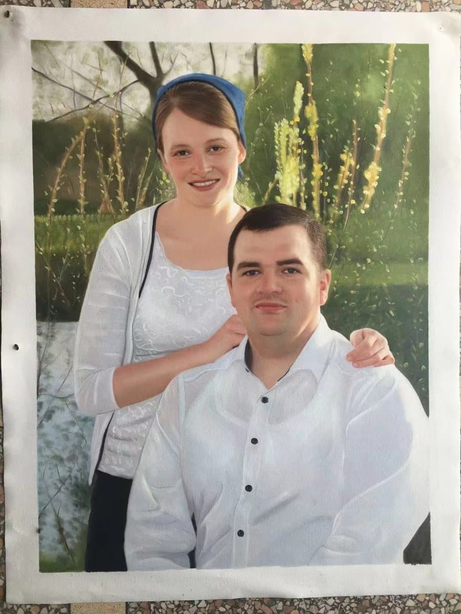 Oil painting of a couple in a garden