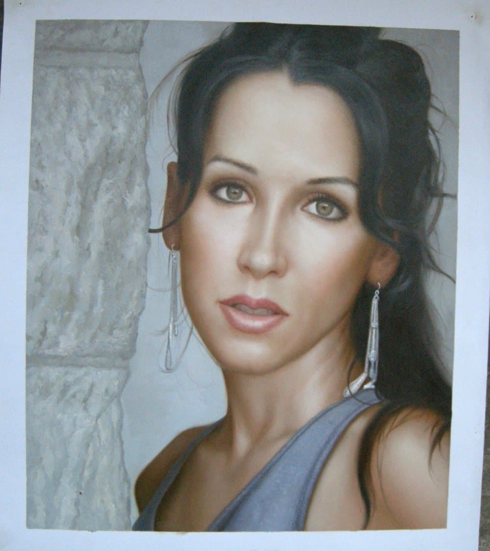 Oil painting of a woman with long dark hair