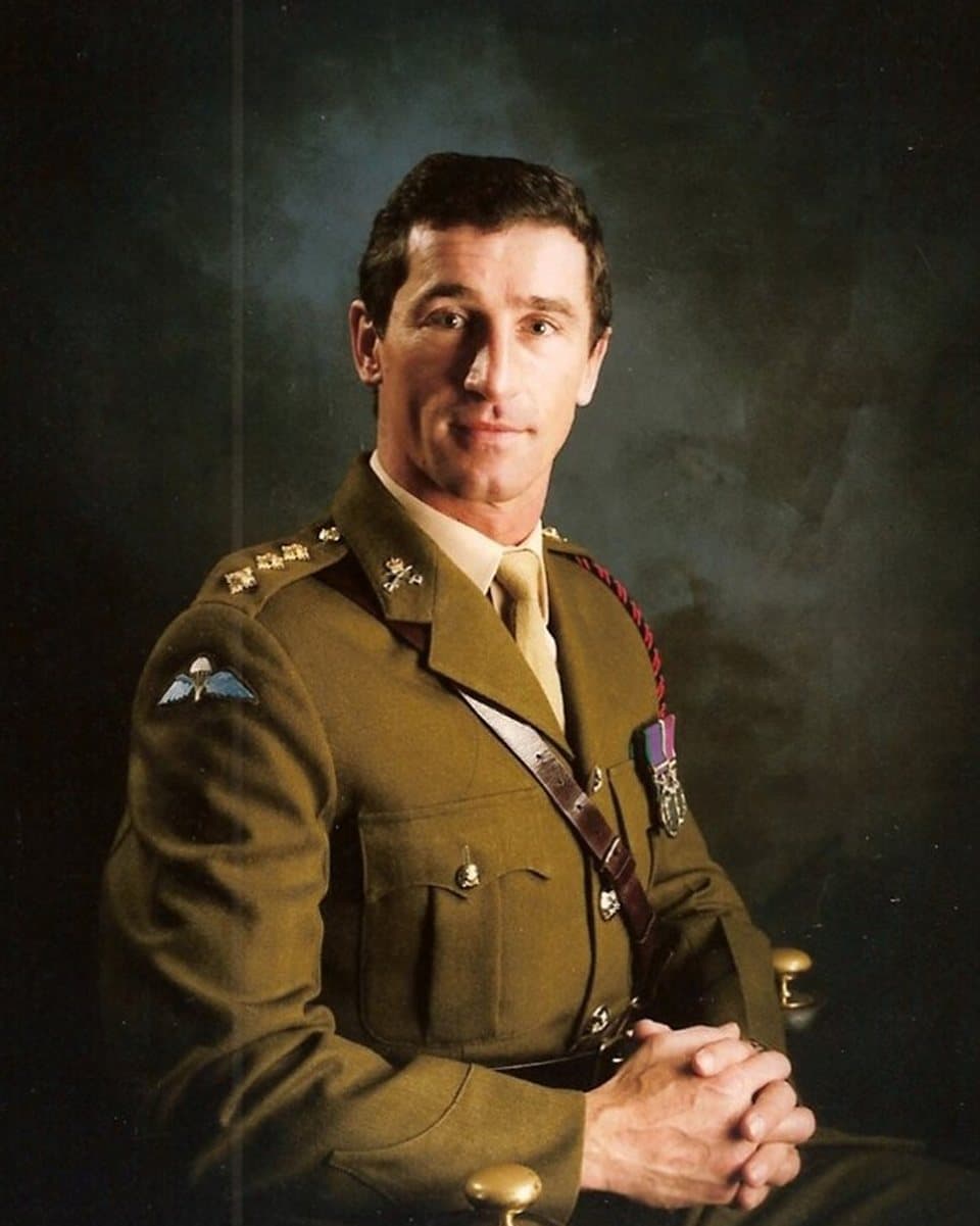 The photograph of an army officer in uniform that the painting was made from