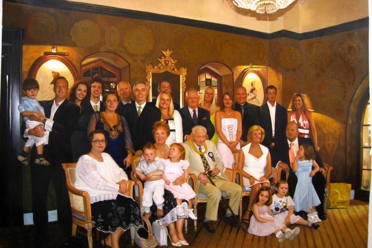 Oil painting of a large family gathered in a function room, hand-painted from a photograph