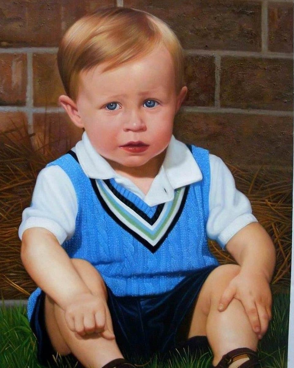 Oil painting of a toddler sitting on the grass, hand-painted from a photograph