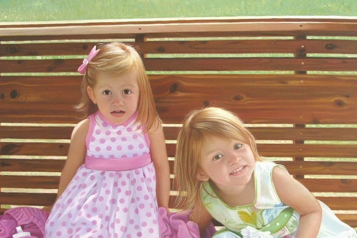 Oil painting of two little girls on a garden bench, hand-painted from a photograph